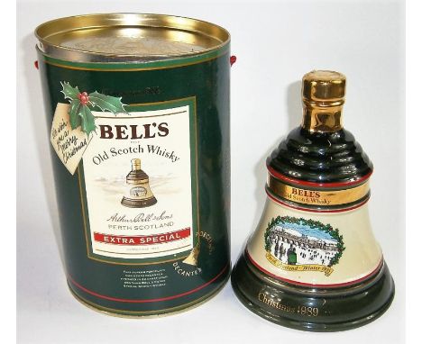 A Bells Scotch Whisky decanter, for Christmas 1989, with original box.