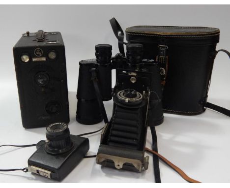 A Kodak folding camera, a box camera, a pair of binoculars, etc.
