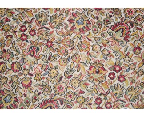 An Axminster Persian style patterned carpet, 307cm x 272cm.