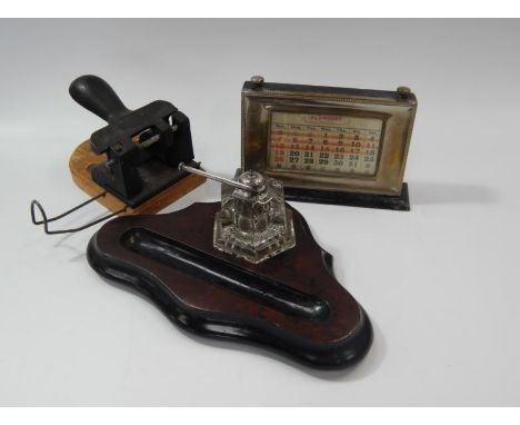 A silver plated vintage perpetual desk calendar, and a mahogany desk stand with hexagonal glass ink receiver, and a vintage h