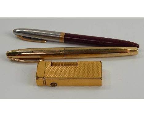 A Dunhill rolled gold lighter, a Sheaffer rolled gold fountain pen and another, (3).