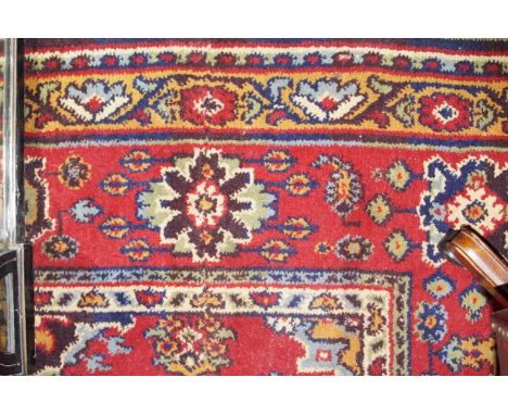 An Axminster Persian design patterned carpet, 362cm x 268cm.  