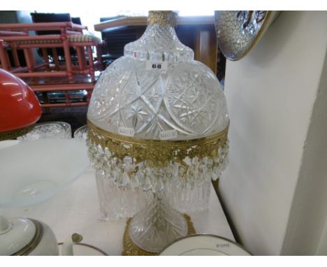 AN ORNAMENTAL TABLE LAMP