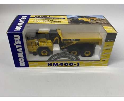 A BOXED KOMATSU HM 400-1 ARTIC DUMP TRUCK REF NO 40014 SCALE 1:50 