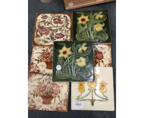 SEVEN VINTAGE WALL TILES, THREE WITH TUBE LINING FLOWERS 