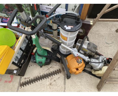 AN ASSORTMENT OF GARDEN TOOLS TO INCLUDE A BIIGBEAR PETROL STRIMMER AND A MCCULLOCH HEDGE TRIMMER ETC 