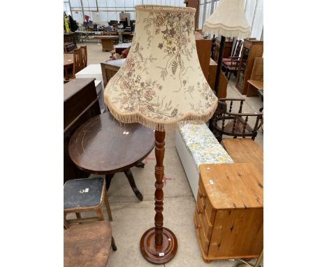 A PINE STANDARD LAMP COMPLETE WITH SHADE 