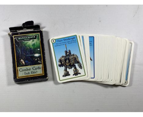 A BOXED VINTAGE 1990'S WARHAMMER 40K DARK ELDER COMBAT CARD DECK AND FURTHER LATE 90'S WARHAMMER 40K CHAOS CARDS 