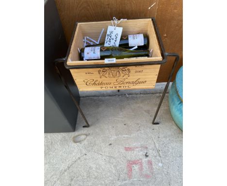 A MONOGRAMED WINE CRATE WITH A METAL TRIPOD STAND 