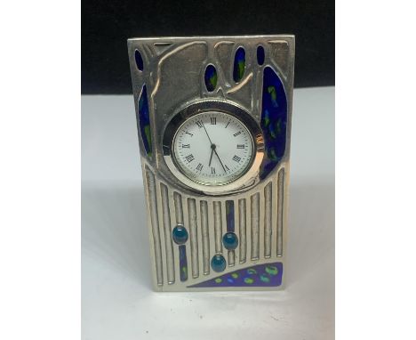 A SMALL CHARLES RENNIE MACINTOSH MANTLE CLOCK 