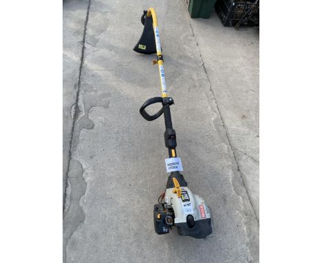 A RYOBI PETROL ENGINE GRASS STRIMMER 