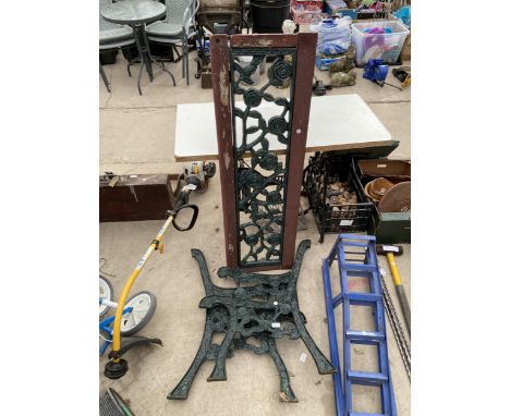 A PAIR OF DECORATIVE CAST IRON BENCH ENDS AND A FLORAL CAST IRON BENCH BACK 