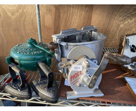 AN ASSORTMENT OF VINTAGE ITEMS TO INCLUDE TWO FLAT IRONS AND A MANUAL GRINDSTONE ETC 