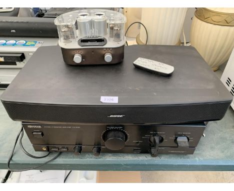 A KENWOOD STEREO INTERGRATED AMPLIFIER, A BOSE SPEAKER AND A ROTH DOCKING STATION 