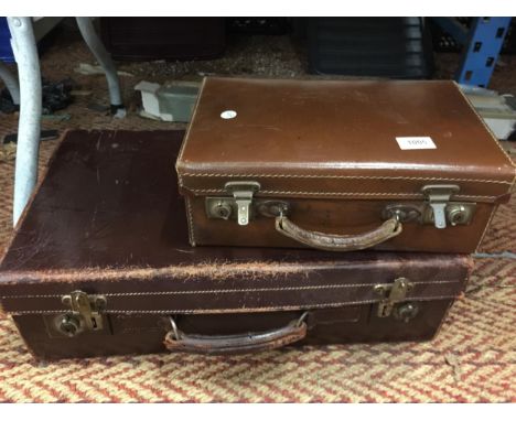 TWO VINTAGE LEATHER SUITCASES 