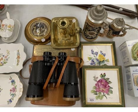 A MIXED LOT TO INCLUDE FRAMED TILES, CASED SWALLOW BINOCULARS, STEINS, A BRASS CANDLESTICK, CRIBBAGE BOARD AND A BAROMETER 