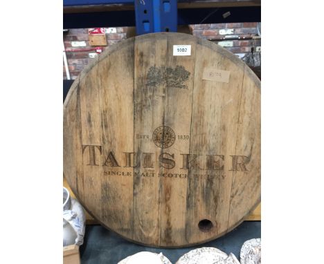 A LARGE WOODEN ROUND TALISKER SCOTCH WHISKY SIGN DIAMETER 55CM 