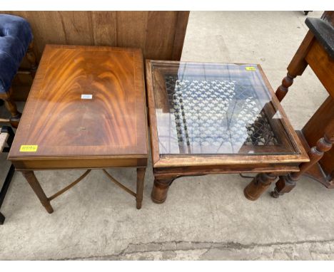 A HARDWOOD LAMP TABLE WITH GLASS TOP AND METALWARE DECORATION AND MAHOGANY CROSSBANDED COFFEE TABLE 