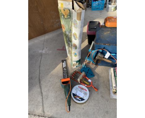 AN ASSORTMENT OF TOOLS TO INCLUDE A DRILL AND DRILL STAND AND HEDGE TRIMMER ETC 