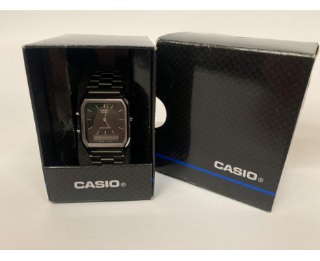 A BOXED CASIO DUEL WRIST WATCH 