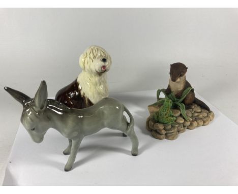 THREE ANIMAL FIGURINES TO INCLUDE A GOEBEL OLD ENGLISH SHEEP DOG, A MIDWINTER DONKEY AND A BORDER FINE ARTS OTTER 