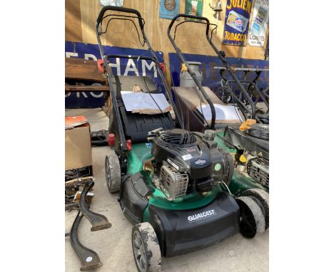 A QUALCAST PETROL ENGINE LAWN MOWER WITH BRIGGS AND STRATTON ENGINE AND A GRASS BOX 