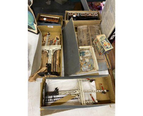 A GROUP OF FOUR VINTAGE BOXED BING MODEL RAILWAY ITEMS - TWO CARRIAGES AND TWO BING SIGNAL LIGHTS 