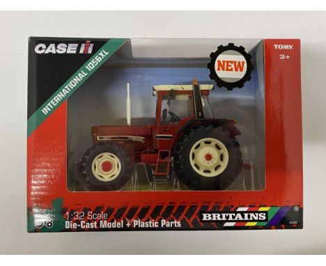 A BRITAINS MODEL OF AN INTERNATIONAL 1056XL TRACTOR REF NO 43329 SCALE 1:32 