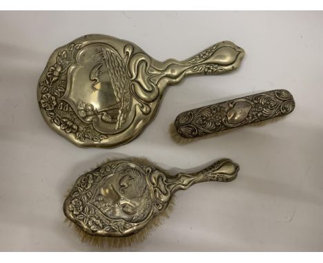 A SILVER PLATED VINTAGE DRESSING TABLE BRUSH AND HAND MIRROR SET IN AN ART NOUVEAU STYLE 