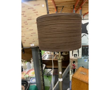 A RETRO STYLE METAL STANDARD LAMP ON A STEPPED PEDESTAL 