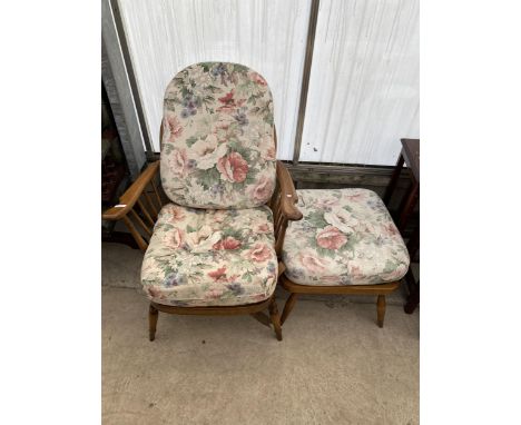 AN ERCOL FURNITURE WHEELBACK FIRESIDE CHAIR AND STOOL 