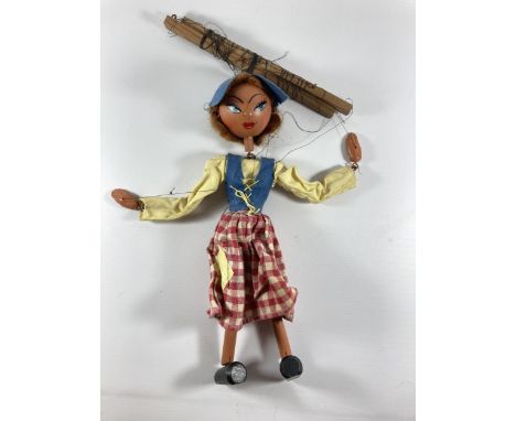 A VINTAGE PELHAM PUPPET OF A GIRL IN A PELHAM BOX 