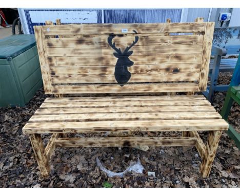A WOODEN SLATTED GARDEN BENCH WITH PAINTED STAG BACKGROUND 