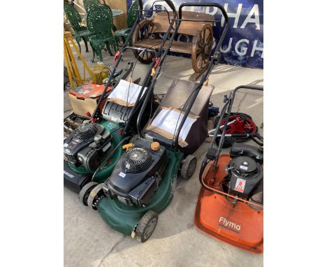 A PETROL ENGINE LAWN MOWER WITH GRASS BOX 