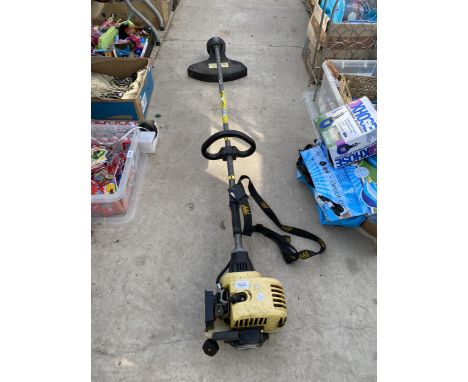 A MCCULLOCH PETROL ENGINE GRASS STRIMMER 