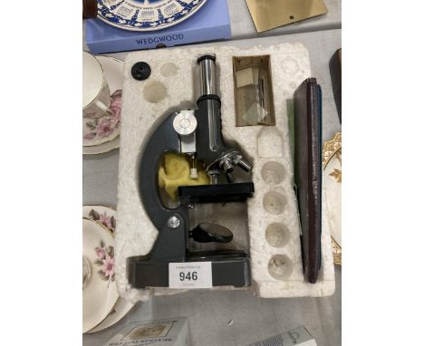 A 'GREENKAT' SMALL MICROSCOPE WITH SLIDES, ETC 