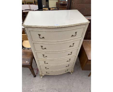 A CREAM AND GILT BOW FRONTED CHEST OF SIX DRAWERS ON CABRIOLE LEGS, 28" WIDE 