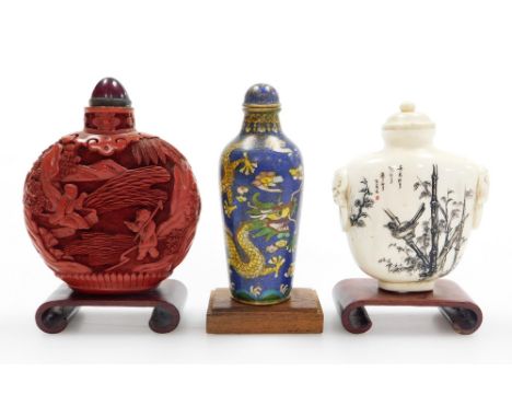 A Chinese cinnabar lacquer snuff bottle and stopper, carved with figures in landscape, 7.5cm high, an early 20thC ivory scent