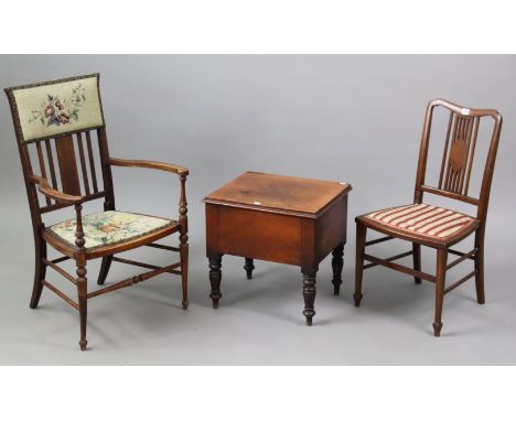 A late Victorian inlaid-beech rail-back elbow chair with a padded seat &amp; back; &amp; on turned tapered legs with spindle 