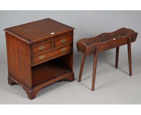A reproduction inlaid-mahogany small side cabinet fitted with a brushing slide above two short &amp; one long drawer with an 