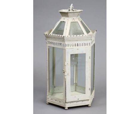 A 20th century cream-painted toleware hall lantern of hexagonal form, with glazed sides.