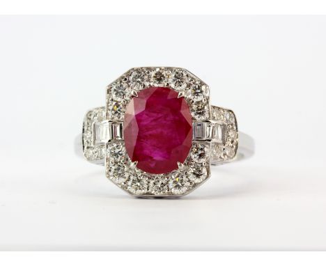 A superb Art Deco style ruby (1.87ct) and baguette and brilliant cut diamond cluster ring, approx. 4gr.
