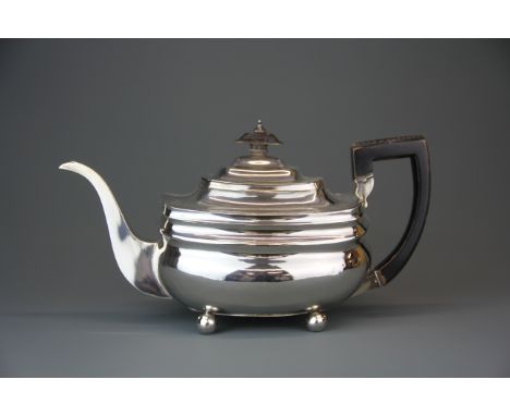 A Georgian hallmarked silver teapot, spout to handle L. 28cm, gross weight approx. 540gr.&nbsp;