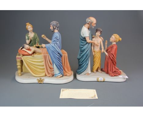 Two rare Capodimonte porcelain figures signed R. Guidolin depicting ancient forms of medicine, one with box, H. 26cm.