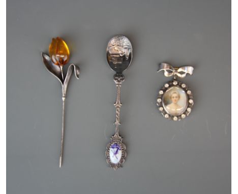 A lovely Edwardian sterling silver mounted hand painted portrait miniature of a lady, L. 5cm. Together with a white metal and