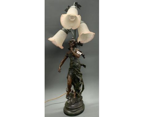 A large figural table lamp, H. 90cm.