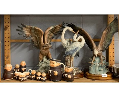 Three large resin figures of birds, H. 46cm. Together with a set of Goebel monks.