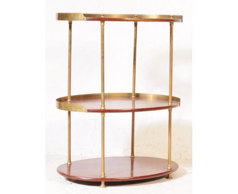 A early 20th century circa.1920's three tier mahogany campaign wash stand / side table. The wash stand being of oval form wit
