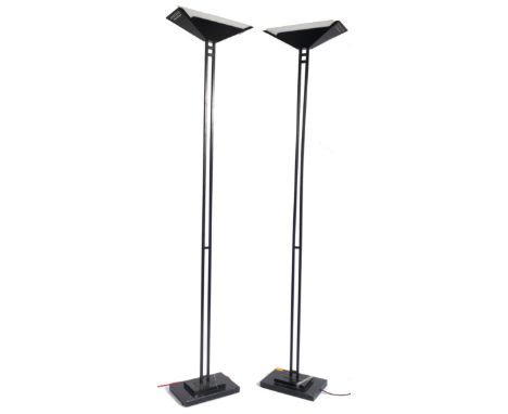 A matching pair of contemporary uplighters / standard lamp lights having a tapering rectangular top with milk glass liners ra