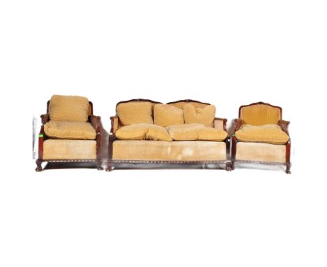 A set of early 20th century mahogany and rattan bergere armchairs with a matching two seater sofa.&nbsp;Having palmette mould